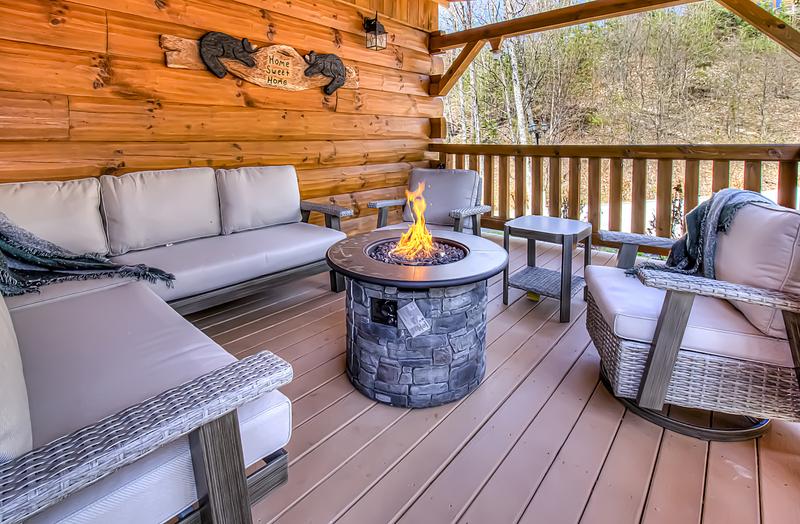 Covered gas fire pit at Smoky Mountains rental cabin. at A Point of View in Gatlinburg TN