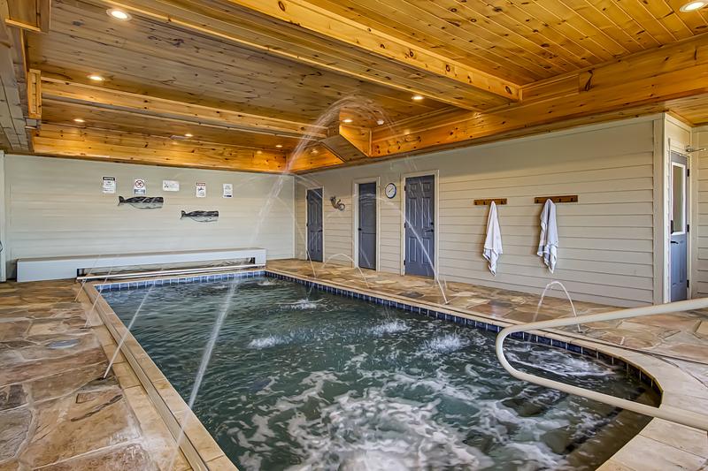 Indoor swimming pool with water fountain jets. at A Point of View in Gatlinburg TN