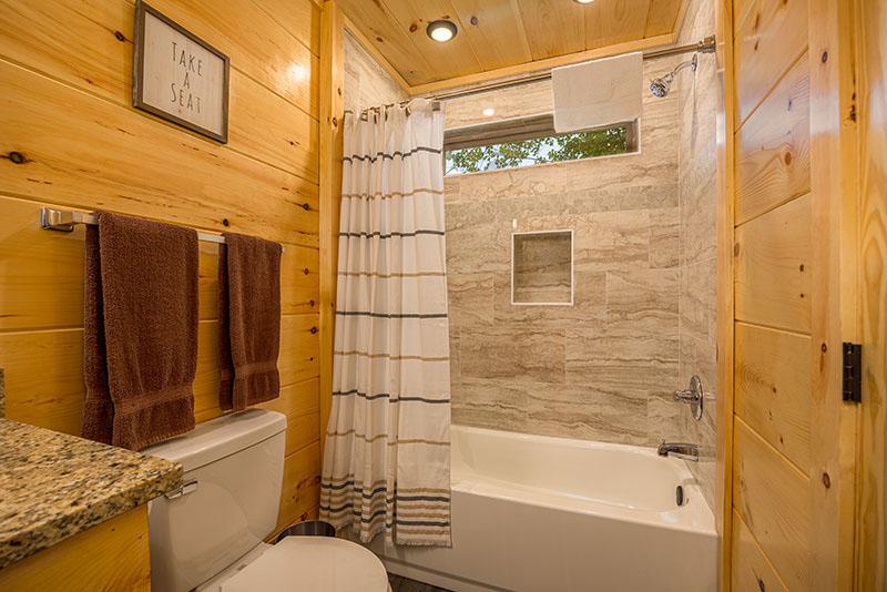 Tub shower of your second bath. at Big Splash Lodge in Gatlinburg TN