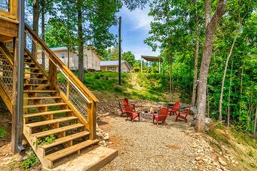 Stairs leading down to the cabin's fire pit. at Big Splash Lodge in Gatlinburg TN