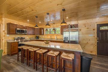 Plenty of seating at the breakfast bar of your cabin. at Big Splash Lodge in Gatlinburg TN