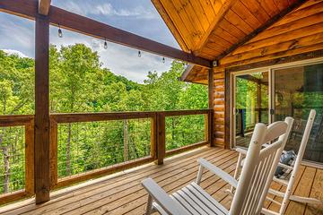 Rockers for relaxing under your covered porch. at Big Splash Lodge in Gatlinburg TN