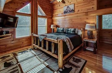 Loft cabin bedroom with private bath. at A Great Escape in Gatlinburg TN