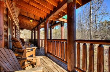 Large porches across your Smoky Mountain cabin. at A Great Escape in Gatlinburg TN