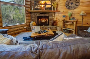 Seasonal gas log fireplace at you log cabin rental. at A Great Escape in Gatlinburg TN