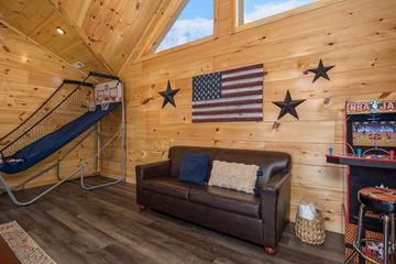 Seating area of the cabin's game room. at Big Splash Lodge in Gatlinburg TN