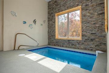 Photo of your cabin pool in the daytime. at Big Splash Lodge in Gatlinburg TN