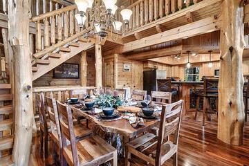 View of the large dining table into the kitchen. at Alpine Oasis in Gatlinburg TN