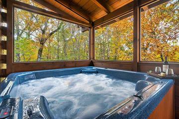 Enjoy a relaxing dip in your private cabin hot tub. at Alpine Oasis in Gatlinburg TN