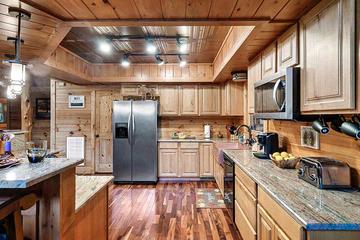 Fully equipped kitchen at your cabin in the Smokies. at Alpine Oasis in Gatlinburg TN