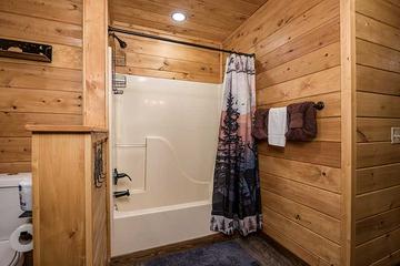 Second bedroom's bath shower combo. at Moonlight Obsession in Gatlinburg TN