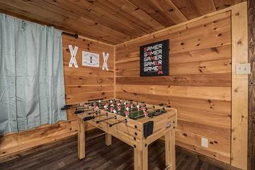 Smoky Mountains rental cabin with foosball table. at Moonlight Obsession in Gatlinburg TN