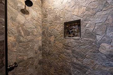 Stone covered shower in your 3rd bedroom. at Sunset Peak in Gatlinburg TN