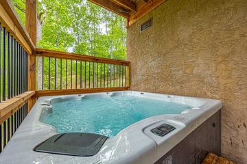 our cabin's hot tub during the daytime. at Morning View in Gatlinburg TN