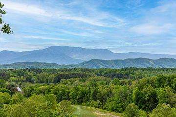 Early Smoky Mountains mist as seen from your front porch at Mountain View cabin. at Morning View in Gatlinburg TN