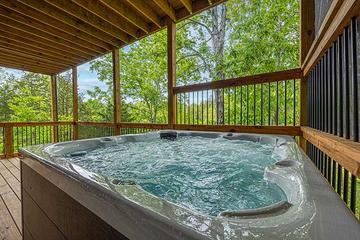 Cozy hot tub fun at your cabin in the Smokies at Sunset Peak in Gatlinburg TN