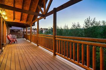 Sit outdoors and take in the Smoky Mountain sound of nature. at Cabin Fever Vacation in Gatlinburg TN