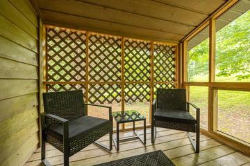 Screened in cabin porch. at Pigeon Forge Getaway in Gatlinburg TN