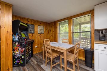 Multiplayer arcade game and dining area. at Pigeon Forge Getaway in Gatlinburg TN