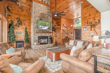 Plenty of lush couches for family and friends. at Five Bears Mountain View Lodge in Gatlinburg TN