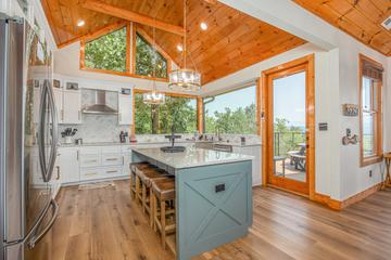 Snacks to holiday meals made easy in this fully equipped kitchen. at Five Bears Mountain View Lodge in Gatlinburg TN