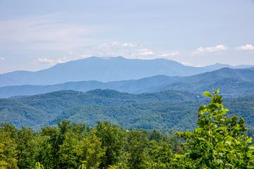 Seemingly endless views of the Smoky Mountains from your cabin rental. at Five Bears Mountain View Lodge in Gatlinburg TN