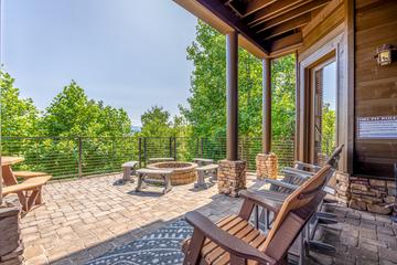 Extra seating near your cabin's fire pit. at Five Bears Mountain View Lodge in Gatlinburg TN