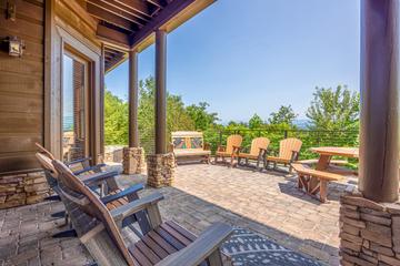 Extra seating near your cabin's picnic area. at Five Bears Mountain View Lodge in Gatlinburg TN