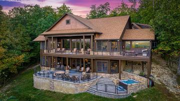 Watch beautiful sunsets from the large porches of your Smoky Mountains cabin.  at Five Bears Mountain View Lodge in Gatlinburg TN