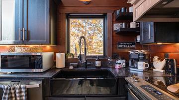 Your Smokies cabin has a beautiful farmer's sink. at Stonehenge Cabin in Gatlinburg TN