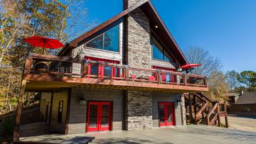 Several cars can park on the paved drive. at Stonehenge Cabin in Gatlinburg TN