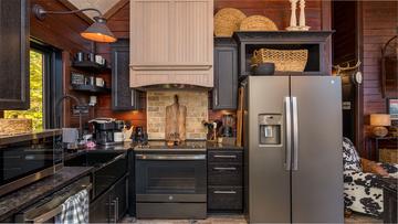 Fully equipped cabin kitchen at Stonehenge. at Stonehenge Cabin in Gatlinburg TN