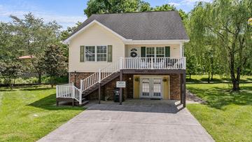 Exterior of your Pigeon Forge vacation cottage near the Little Pigeon River. at River Waltz in Gatlinburg TN