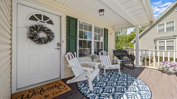 Front deck of your River Bend cottage in Pigeon Forge Tennessee. at River Waltz in Gatlinburg TN