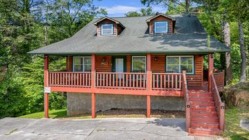 The exterior of your Smoky Mountains 5 bedroom cabin getaway. at Bear Crossing in Gatlinburg TN