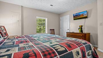 Your cabin in the Smokies fourth bedroom with television. at Bear Crossing in Gatlinburg TN