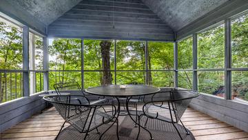 Dine outdoors with family and friends in this enclosed area. at Chalet All Day in Gatlinburg TN