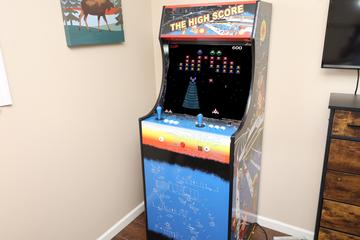 This awesome Smoky Mountains vacation home features and arcade machine with over 500 various games. at Bear Splashin Fun in Gatlinburg TN