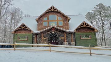 A spectacular big cabin rental in the Tennessee Smoky Mountains with indoor private pool, home theater, outdoor fireplace with kitchen and so much more!l. Celebrate the Christmas season in this spectacular Smoky Mountains cabin rental.