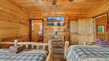 Morning View Cabin Rental Third bedroom at Morning View cabin with tv.