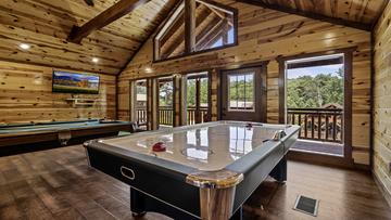 Cabin Air Hockey Table Family members can enjoy free games of air hockey.