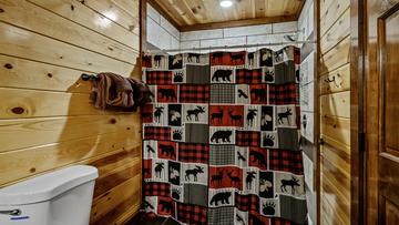 Rustic Log Cabin Bath Enjoy the soothing charm of your cabin bath.