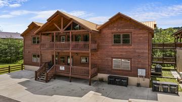 Smoky Mountains Cabin Fever Vacation Exterior view of Cabin Fever Vacation in the Tennessee Smoky Mountains.