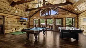 Pool And Air Hockey Big cabins are lots of fun with all the recreational ammenities they offer.