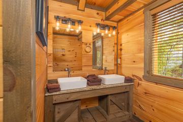 Dual farm sinks in the second upstairs bath. at The Appalachian in Gatlinburg TN