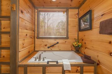 Second cabin bedroom's Jacuzzi tub for added relaxation. at The Appalachian in Gatlinburg TN