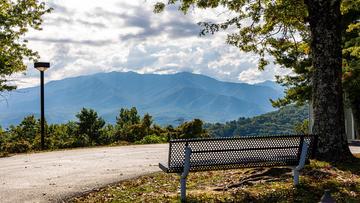 Smoky Mountain Views From Shaded Bench Smoky Mountain views from tree shaded bench.