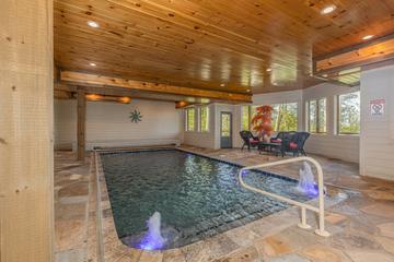 Cabin's swimming pool has unique water spouts. at The Appalachian in Gatlinburg TN