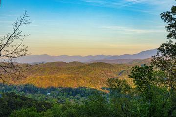 Let go of the everyday and take in endless Smoky Mountain views from your 5 bedroom log cabin, The Appalachian. at The Appalachian in Gatlinburg TN