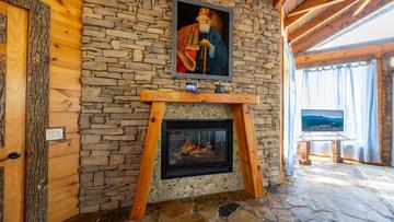 Smokies Cabin Fireplace Gas log stacked stone fireplace at your Smokies cabin.
